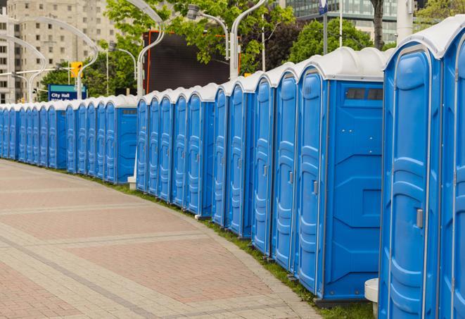 a line of portable restrooms at a sporting event, providing athletes and spectators with clean and accessible facilities in Beverly Hills